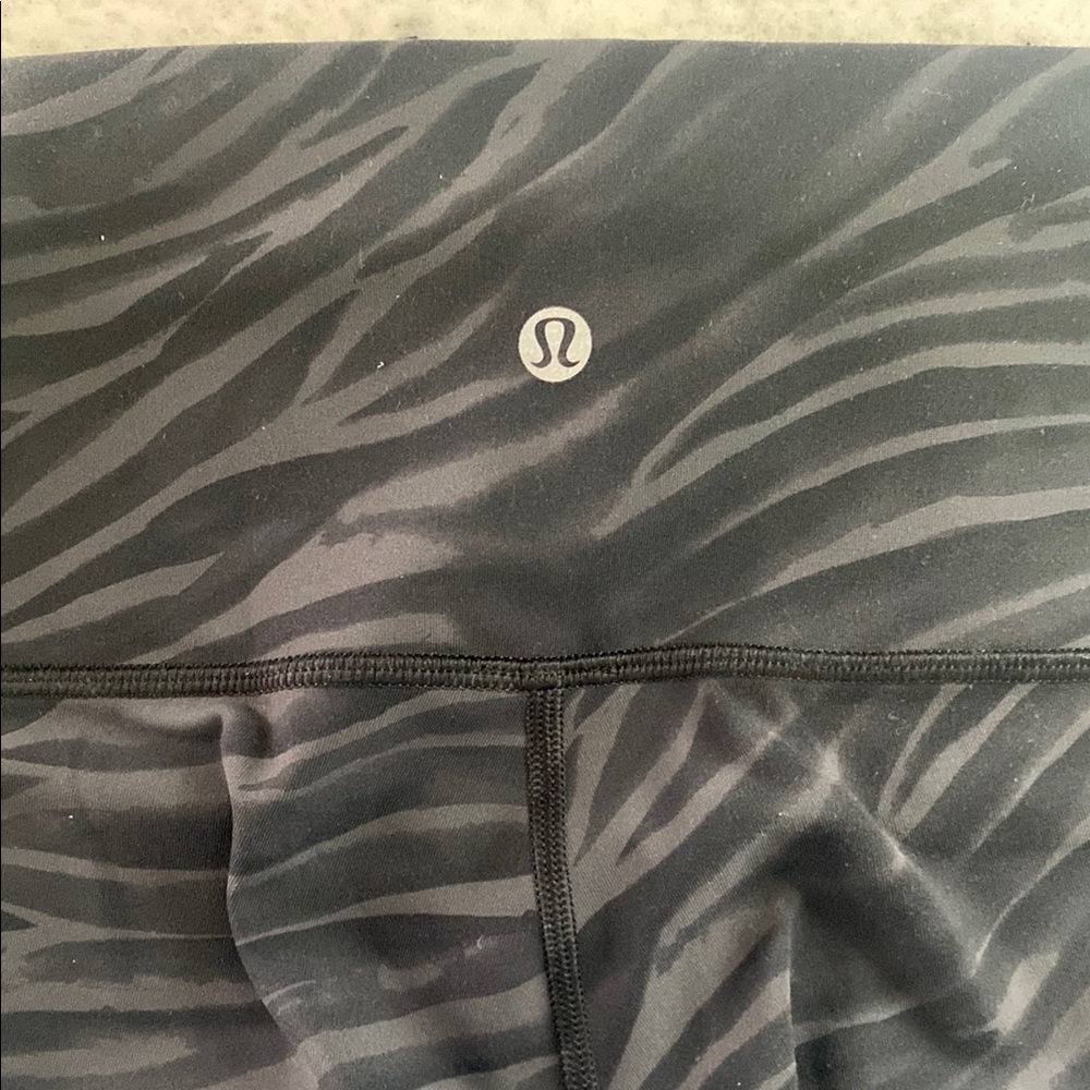 Black Zebra Print Lululemon Leggings - Picture 2 of 3